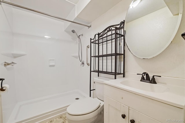 8137 Vanguard Dr, Denver, CO 80221 - bathroom with toilet, a shower, and vanity