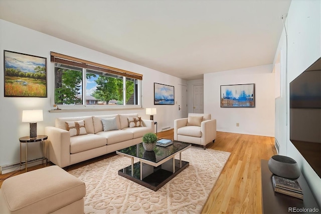 8137 Vanguard Dr, Denver, CO 80221 - living room with wood finished floors and baseboard heating