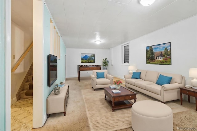 8137 Vanguard Dr, Denver, CO 80221 - living area featuring light carpet, stairs, and baseboards