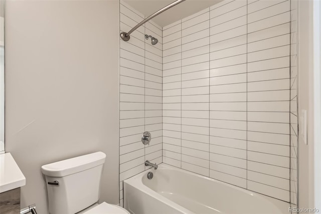 bathroom with toilet and shower / bathing tub combination