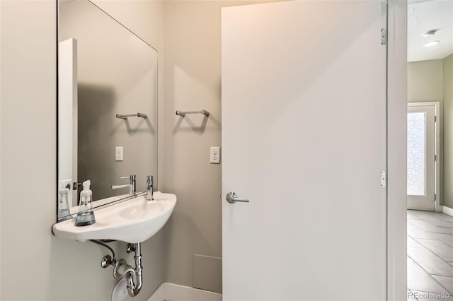 bathroom with tile patterned flooring