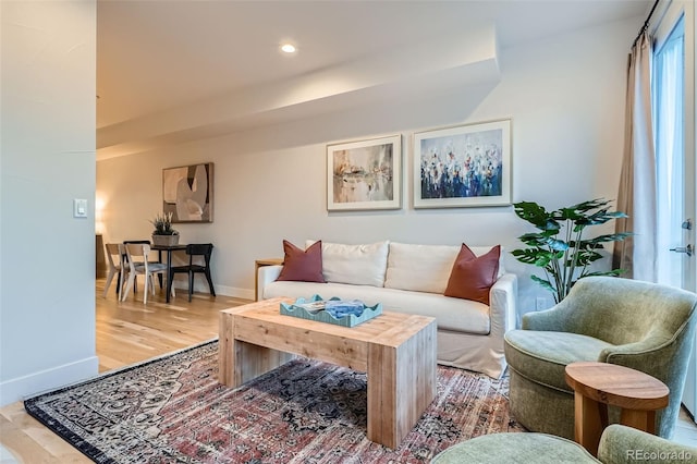1810 Irving St Unit 4, Denver, CO 80204 - living area featuring baseboards, recessed lighting, and wood finished floors