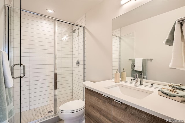 1810 Irving St Unit 4, Denver, CO 80204 - full bath featuring vanity, toilet, a shower stall, and recessed lighting