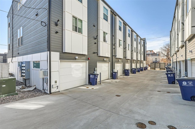 1810 Irving St Unit 4, Denver, CO 80204 - exterior space featuring an attached garage and driveway