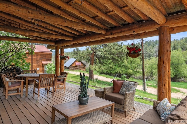 245 N County Highway 67, Sedalia, CO 80135 - deck featuring outdoor dining area and outdoor lounge area