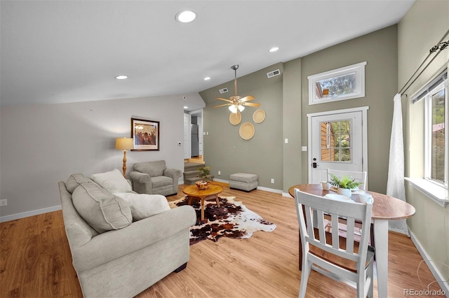 245 N County Highway 67, Sedalia, CO 80135 - living room with vaulted ceiling, light wood finished floors, recessed lighting, and ceiling fan