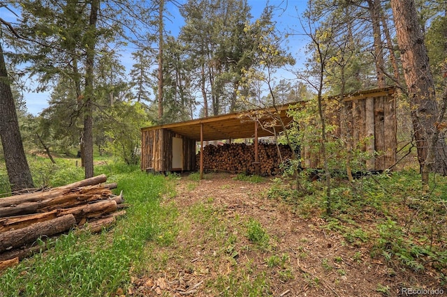 245 N County Highway 67, Sedalia, CO 80135 - view of yard with an outdoor structure