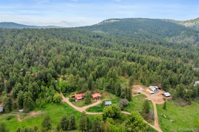 245 N County Highway 67, Sedalia, CO 80135 - bird's eye view of a heavily wooded area and a mountain backdrop