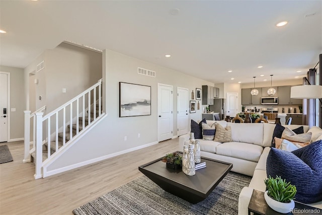 living room with light wood-type flooring