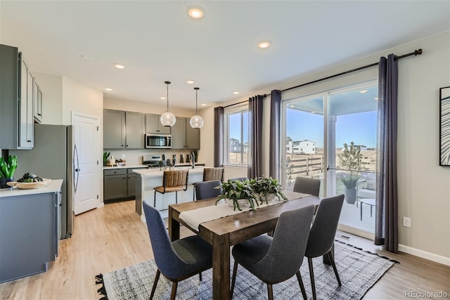 dining room featuring light hardwood / wood-style floors