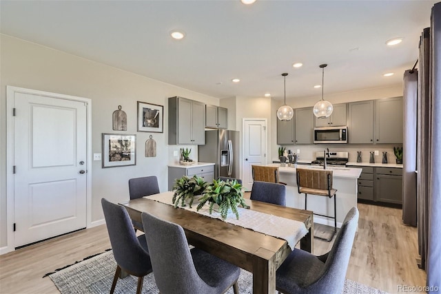 dining area featuring light hardwood / wood-style flooring