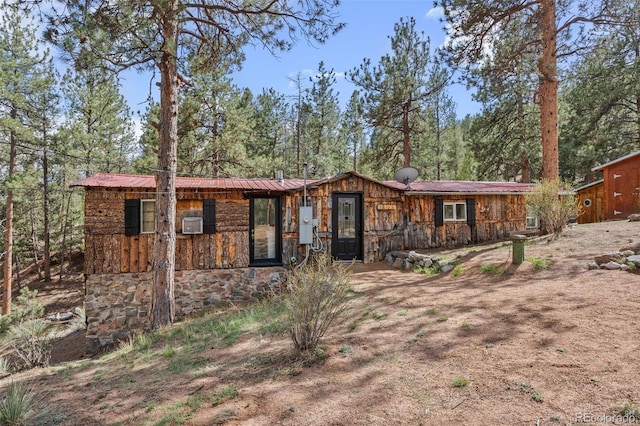 15535 S Elk Creek Rd, Pine, CO 80470 - view of front of house featuring stone siding and metal roof