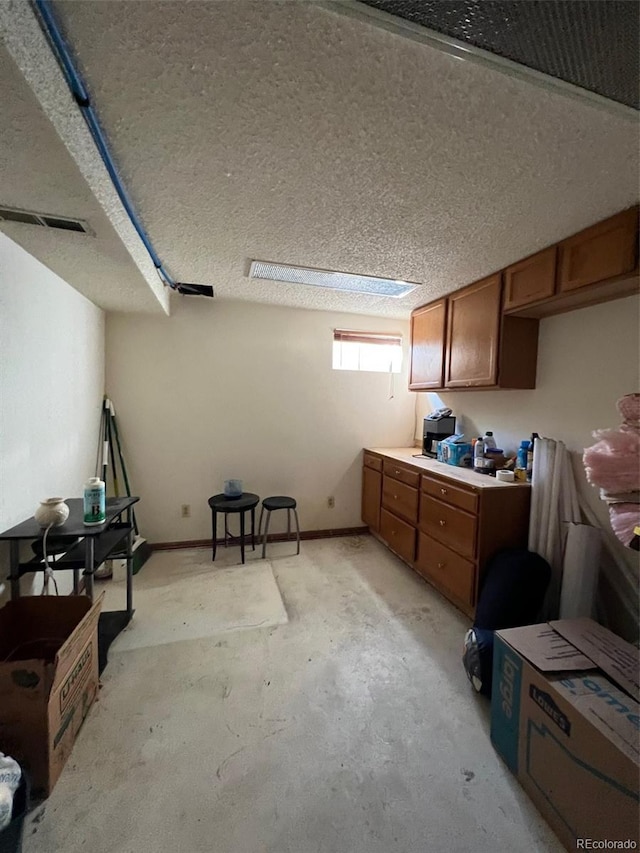 kitchen with a textured ceiling