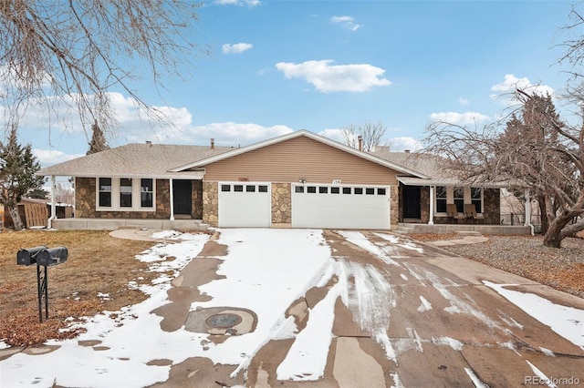 ranch-style home with an attached garage, covered porch, stone siding, driveway, and roof with shingles