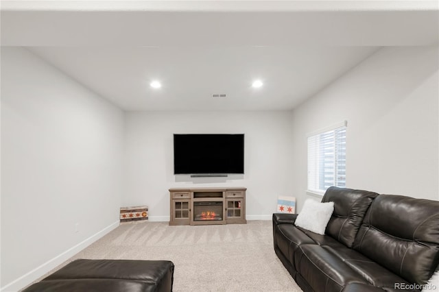 living room featuring carpet floors, recessed lighting, baseboards, and visible vents