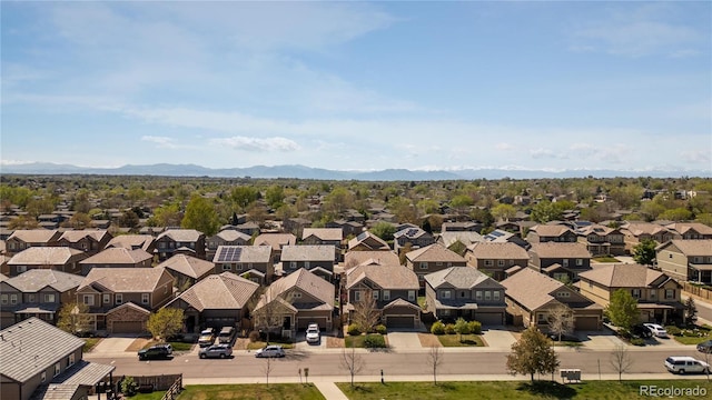 birds eye view of property featuring a residential view and a mountain view