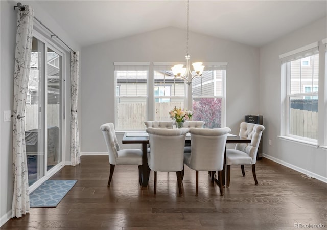 dining area with an inviting chandelier, baseboards, vaulted ceiling, and dark wood-style flooring
