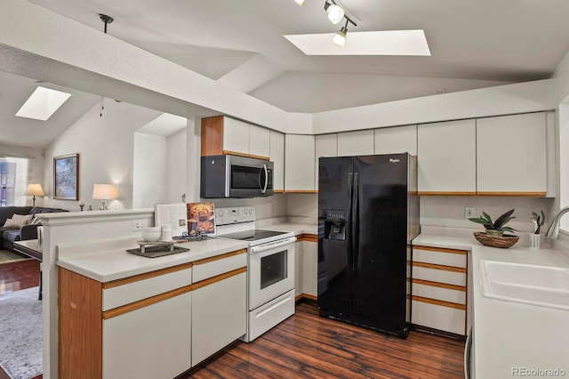 kitchen with dark hardwood / wood-style floors, vaulted ceiling with skylight, white cabinets, white range with electric cooktop, and black refrigerator with ice dispenser