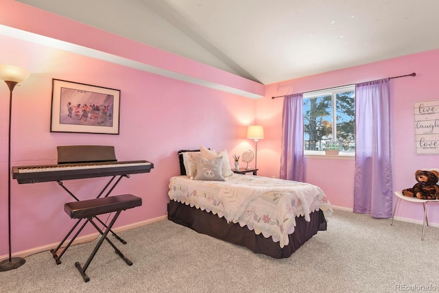 bedroom featuring carpet flooring and vaulted ceiling