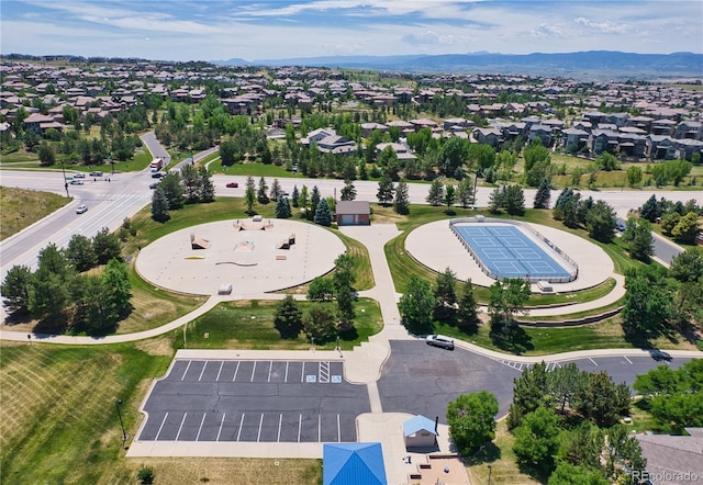 birds eye view of property featuring a residential view and a mountain view