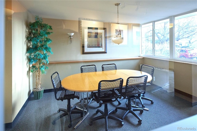 dining space with baseboards