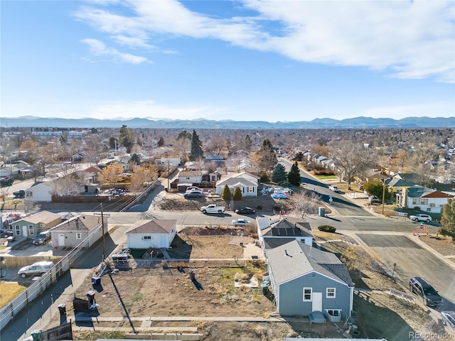 birds eye view of property featuring a mountain view and a residential view