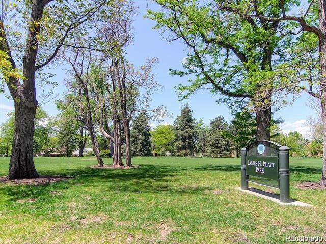 view of property's community with a yard
