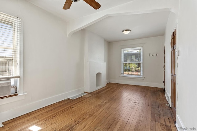914 E Iowa Ave, Denver, CO 80210 - unfurnished living room featuring wood-type flooring and a ceiling fan