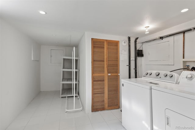 914 E Iowa Ave, Denver, CO 80210 - laundry area with independent washer and dryer and recessed lighting