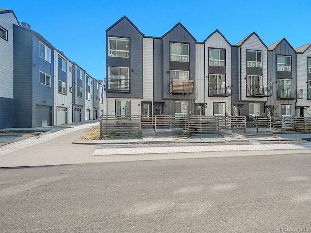 exterior space with a residential view and board and batten siding