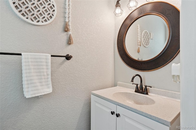 6142 Gorham St, Frederick, CO 80530 - bathroom featuring vanity and a textured wall