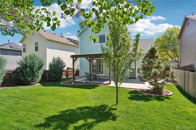 6142 Gorham St, Frederick, CO 80530 - back of property featuring a patio area and french doors