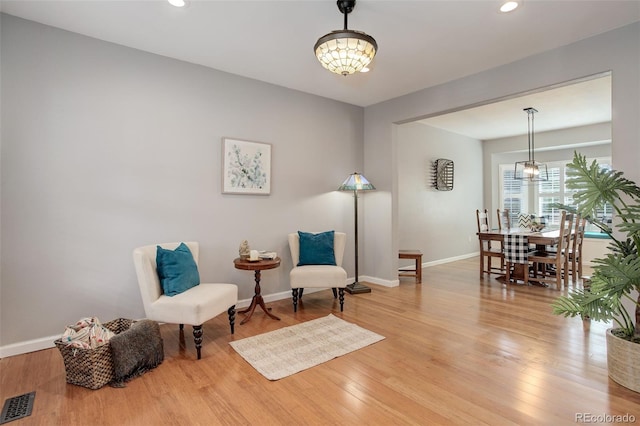 9954 Heywood St, Highlands Ranch, CO 80130 - living area with baseboards, wood finished floors, and recessed lighting