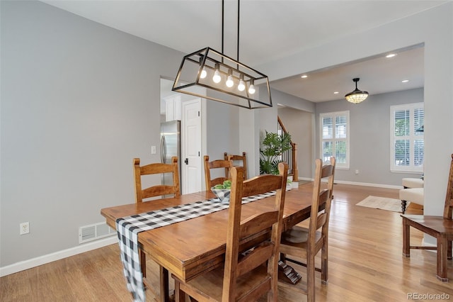 9954 Heywood St, Highlands Ranch, CO 80130 - dining space featuring baseboards, light wood-type flooring, and recessed lighting