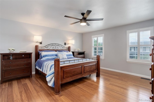 9954 Heywood St, Highlands Ranch, CO 80130 - bedroom featuring light wood-type flooring, baseboards, and a ceiling fan