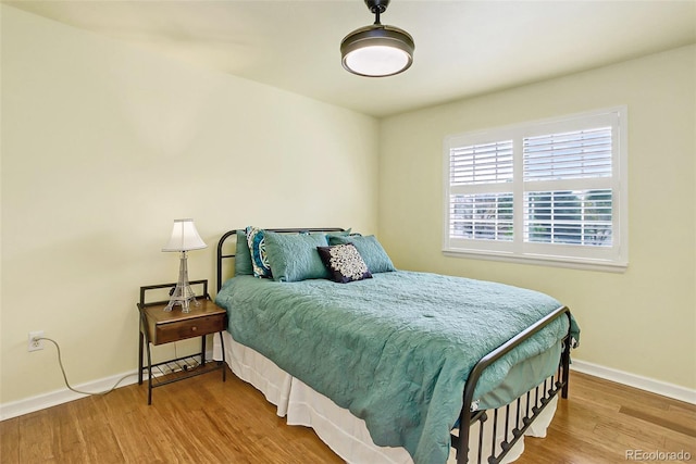 9954 Heywood St, Highlands Ranch, CO 80130 - bedroom with wood finished floors and baseboards