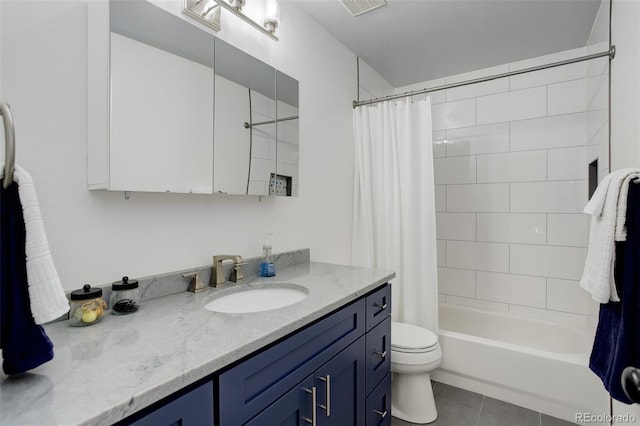 9954 Heywood St, Highlands Ranch, CO 80130 - full bathroom featuring vanity, toilet, tile patterned floors, and shower / bath combo