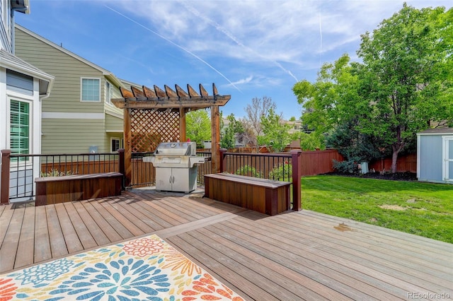9954 Heywood St, Highlands Ranch, CO 80130 - wooden terrace with area for grilling and a pergola