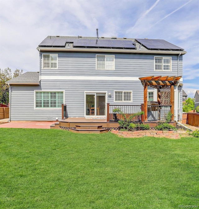 9954 Heywood St, Highlands Ranch, CO 80130 - rear view of property featuring a pergola, a patio area, a deck, and roof mounted solar panels