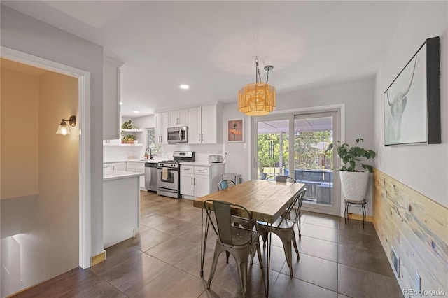 13402 W 24th Pl, Golden, CO 80401 - dining space featuring recessed lighting and dark tile patterned flooring