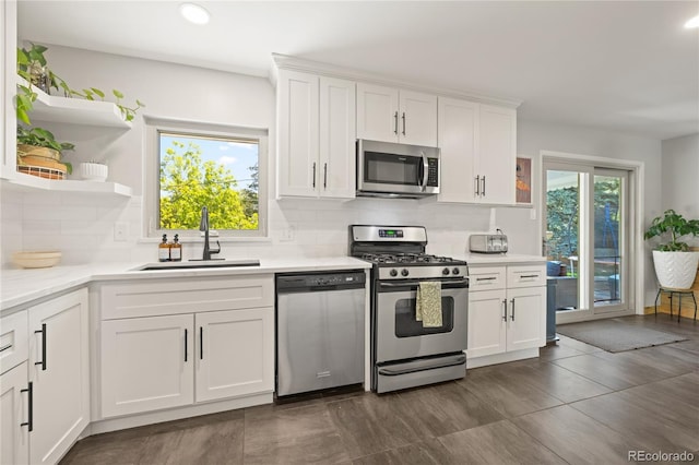 13402 W 24th Pl, Golden, CO 80401 - kitchen with appliances with stainless steel finishes, a sink, plenty of natural light, light countertops, and recessed lighting