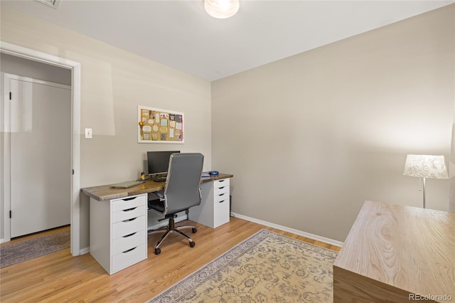13402 W 24th Pl, Golden, CO 80401 - home office featuring light wood-style floors and baseboards