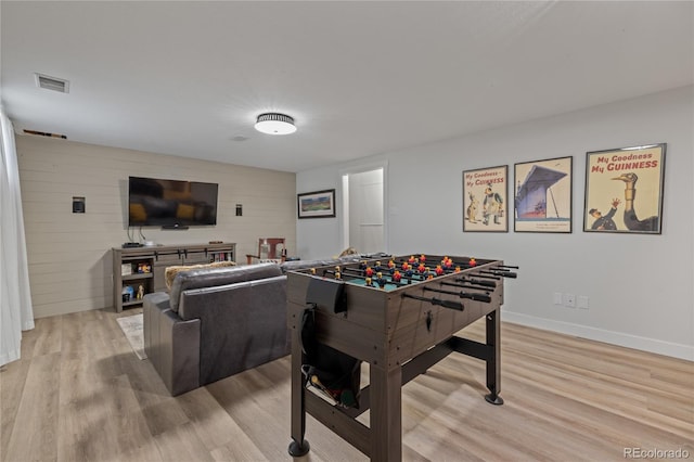13402 W 24th Pl, Golden, CO 80401 - rec room with light wood-style flooring and baseboards