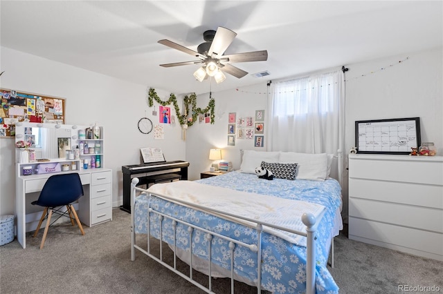 13402 W 24th Pl, Golden, CO 80401 - bedroom featuring light carpet, ceiling fan, and an office area