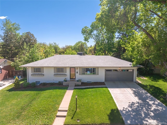 13402 W 24th Pl, Golden, CO 80401 - ranch-style home with a garage, concrete driveway, a front yard, and a shingled roof