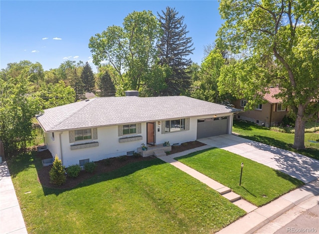 13402 W 24th Pl, Golden, CO 80401 - single story home featuring concrete driveway, an attached garage, a front lawn, and a shingled roof
