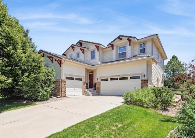 17298 E Lake Pl, Aurora, CO 80016 - craftsman-style home featuring driveway, a garage, and stone siding
