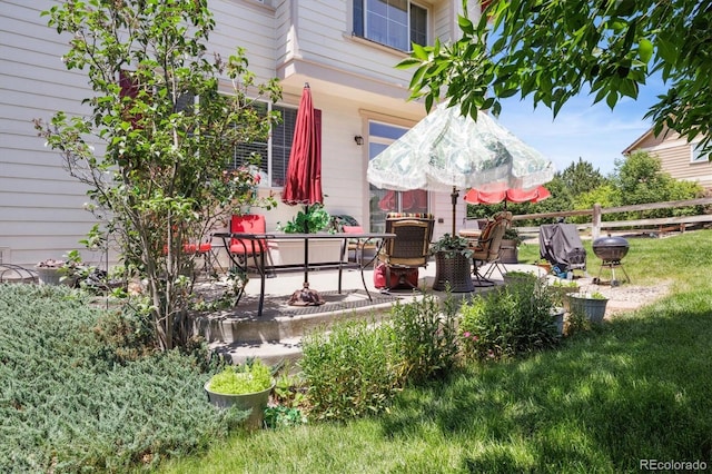 17298 E Lake Pl, Aurora, CO 80016 - view of yard with a patio and outdoor dining area
