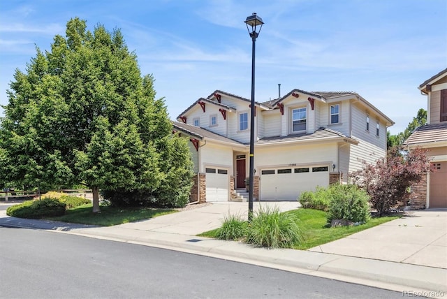 17298 E Lake Pl, Aurora, CO 80016 - view of front of home with driveway and an attached garage