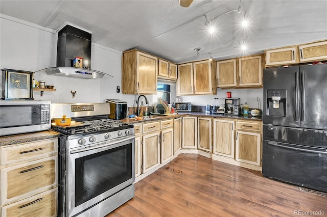 8430 Madison Way, Denver, CO 80229 - kitchen with stainless steel appliances, extractor fan, a sink, dark wood-style floors, and dark stone countertops